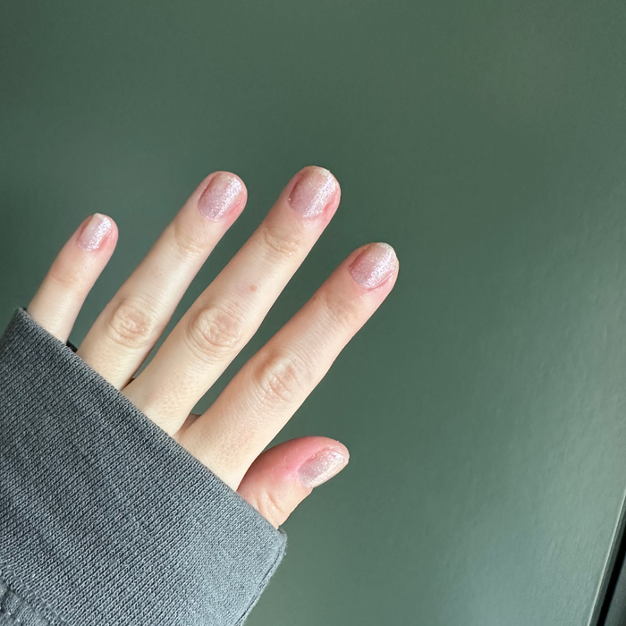 Diamonds Are a Mani’s Best Friend sheer iridescent gel polish on short nails for a subtle sparkling at-home mani look