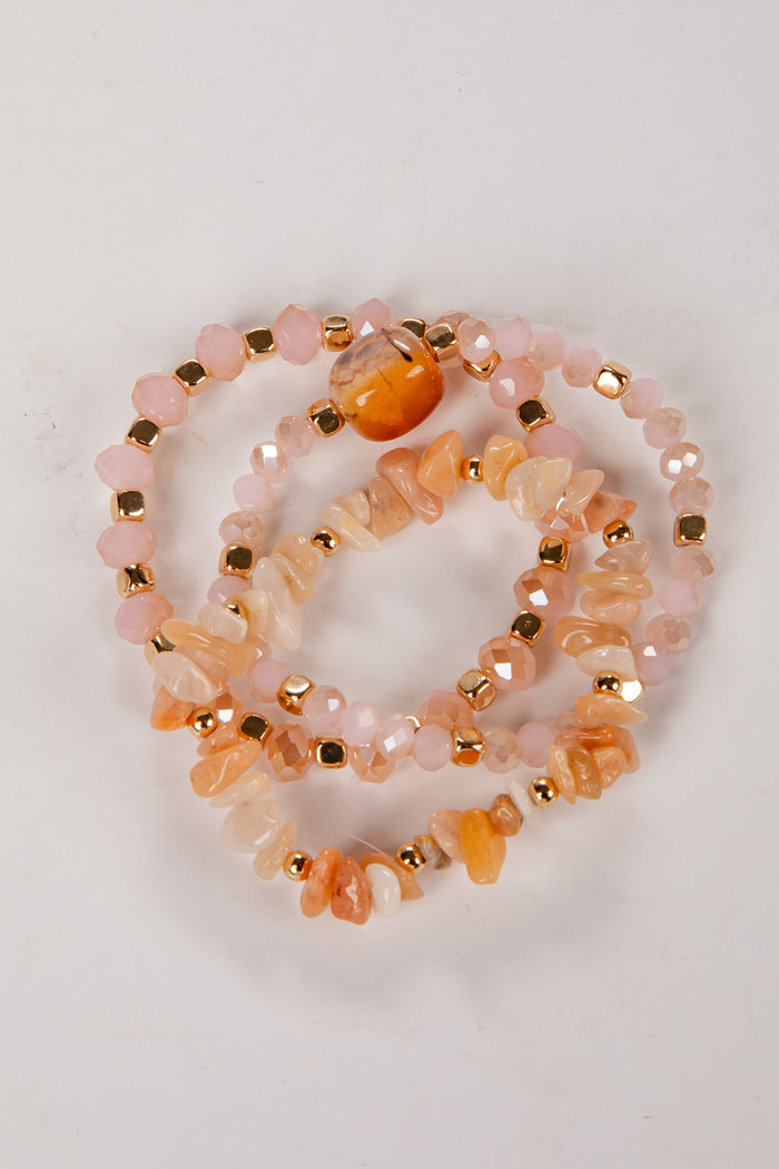 pink and gold beaded bracelet set