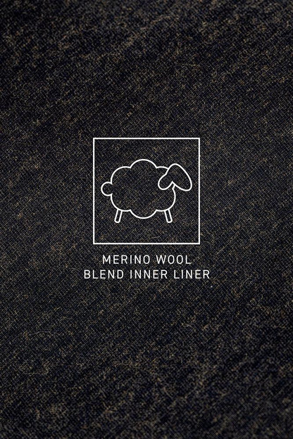 A simple white line drawing of a sheep in a square appears over a dark fabric, suggesting warmth. Below, text reads: 686 Mens Everywhere Merino-Lined Pant - Slim Fit by 686.
