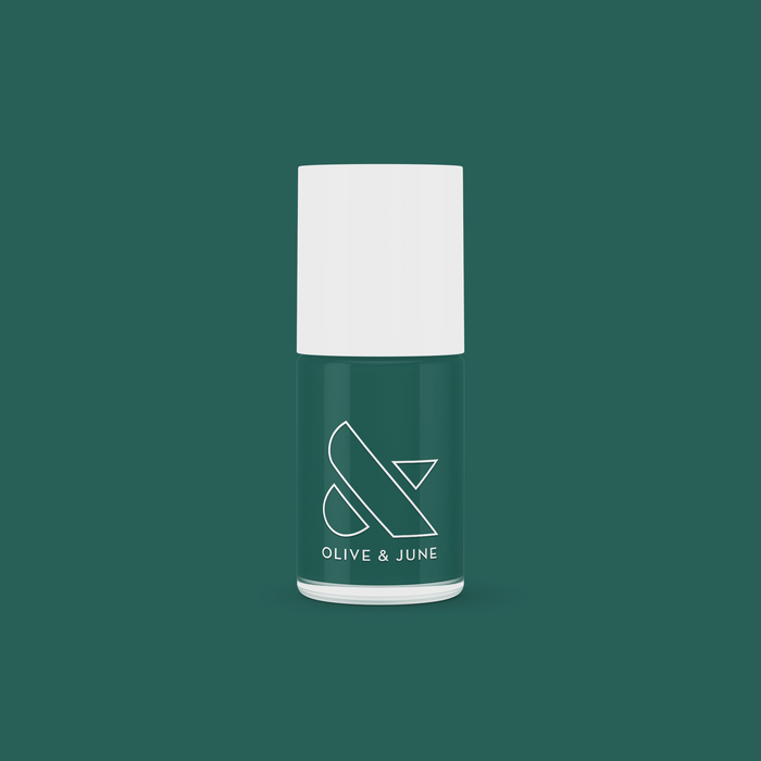 Olive and June Besties polish bottle shown in classic deep emerald green for smooth, long-lasting mani results at home