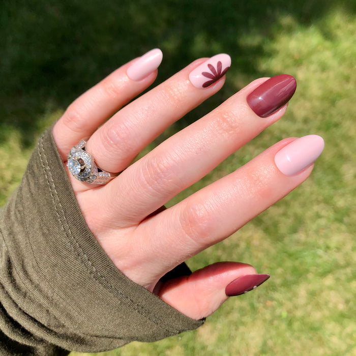 Big Duo Toned Flowers | Medium | Oval - Tab Press-On showing medium oval nails with floral and solid fall tones manicure at home