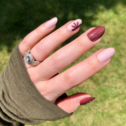 Big Duo Toned Flowers | Medium | Oval - Tab Press-On showing medium oval nails with floral and solid fall tones manicure at home