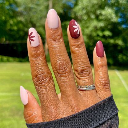 Big Duo Toned Flowers | Medium | Oval - Tab Press-On with medium oval nails featuring floral and solid fall tones manicure at home
