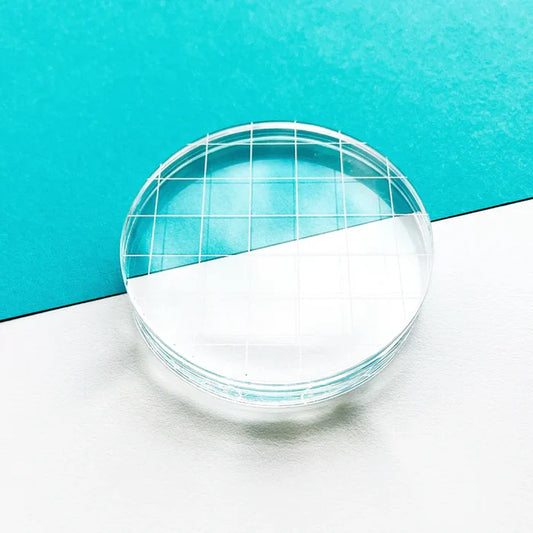 Catherine Pooler - Acrylic Grid Stamping Block - 3-1/4" Round. 3.25" Clear acrylic grid. Available at Embellish Away located in Bowmanville Ontario Canada.