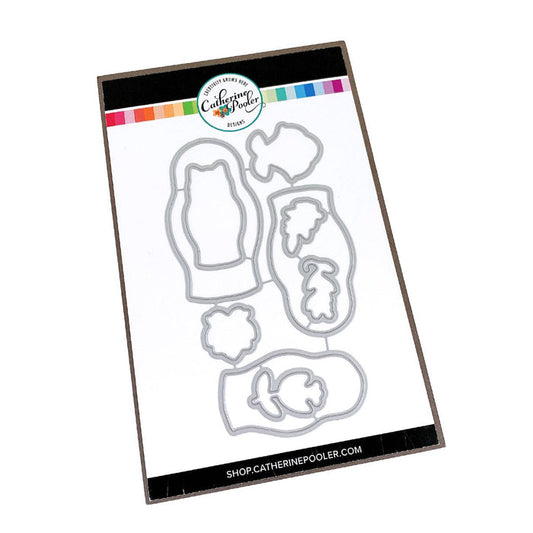 Catherine Pooler - Die Set - We Fit. Remind your friends and loved ones they "just fit" by sending cards made with the We Fit Dies and coordinating We Fit Stamps. Use the dies to cut out one of the three dolls, the cat doll or one of the extras. Layer the pieces to create dimension and fun on all your friendly cards. Available at Embellish Away located in Bowmanville Ontario Canada.