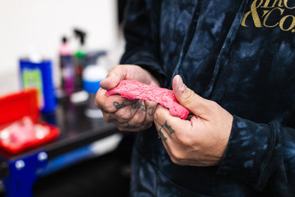 KochChemie Abrasive Clay Bar being stretched.