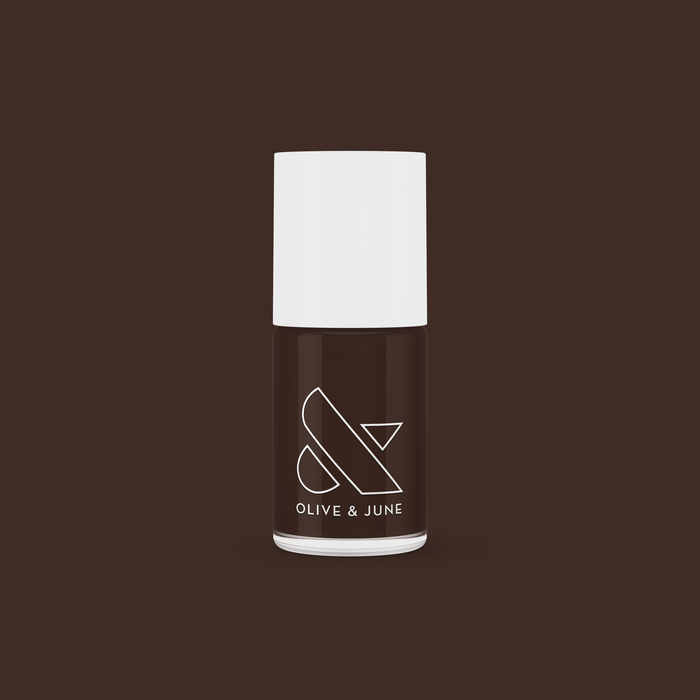 Olive and June CN nail polish bottle shown in silky sable brown shade with smooth, long-lasting finish