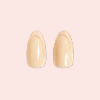Coffee French | Almond | Medium neutral tone almond shaped press-on nails with subtle asymmetrical French manicure design