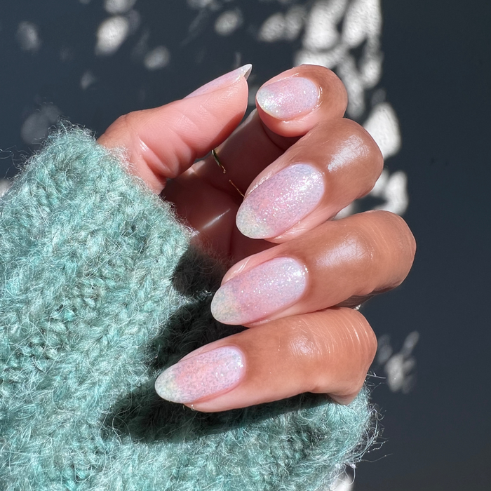 Diamonds Are a Mani’s Best Friend sheer iridescent gel polish on natural nails for a subtle sparkling mani look