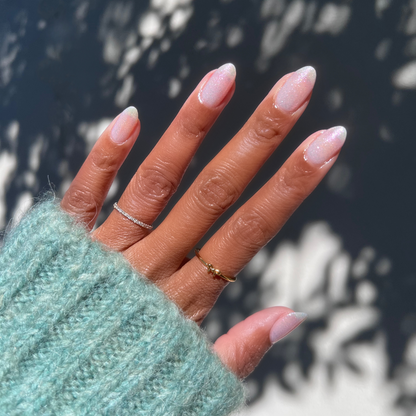Diamonds Are a Mani’s Best Friend sheer iridescent gel polish on nails for a subtle, sparkling at-home manicure look