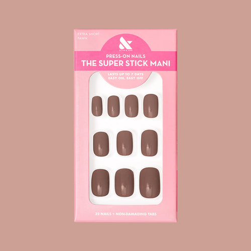 Fawn | Extra Short | Squoval - Tab Press-On featuring minky brown neutral false nails in pink packaging on matching background