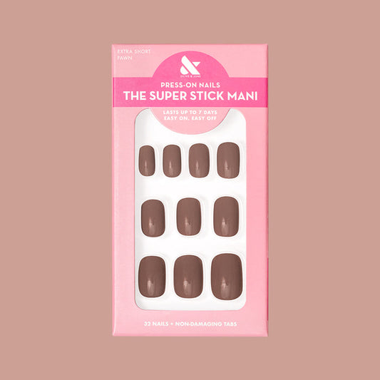 Fawn | Extra Short | Squoval - Tab Press-On featuring minky brown neutral false nails in pink packaging on matching background