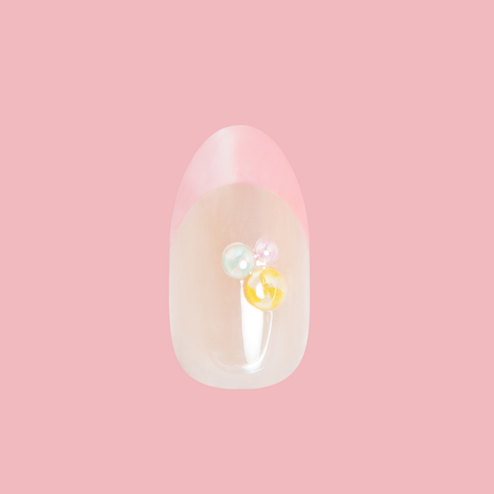 Frosted Candy Pink French - Press-On | Medium | Oval showing oval false nail with iridescent pink French tip and 3D candy drop accents