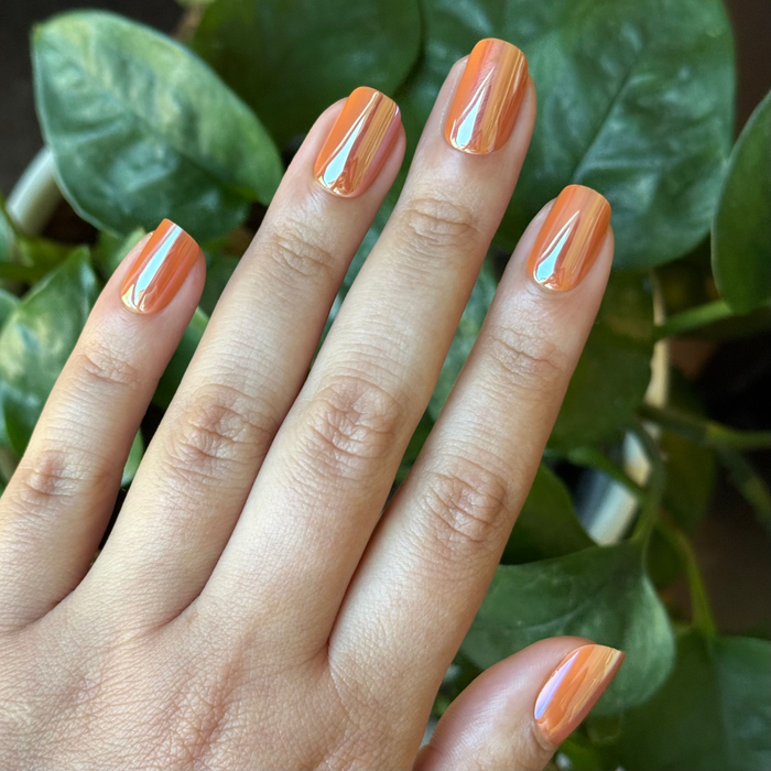 Glazed Pumpkin - Press-On | Short | Squoval short nails in shimmering pumpkin orange with chrome finish for at home manicure
