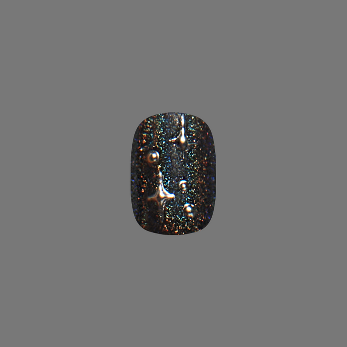Holographic Starry Skies - Press-On | Short | Squoval nail with shimmering night sky mani design and star accents