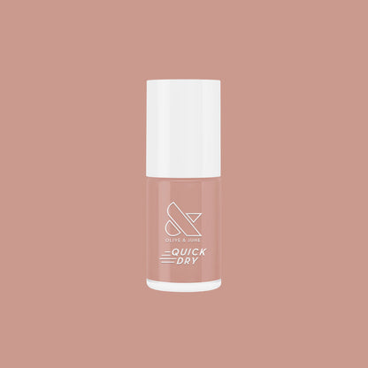 Bottle of Howdy neutral beige nail polish with quick dry formula on matching beige background