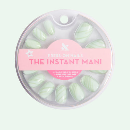 Jade Stone | Round | Short short round press-on nails with cool green jade stone design for easy at-home manicure