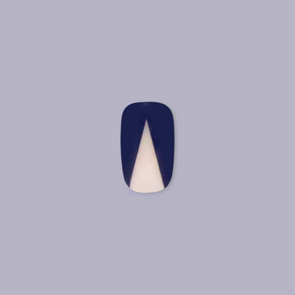 Modern Triangle - Press-On | Short | Squoval nail with navy blue and white negative space triangle design for mani