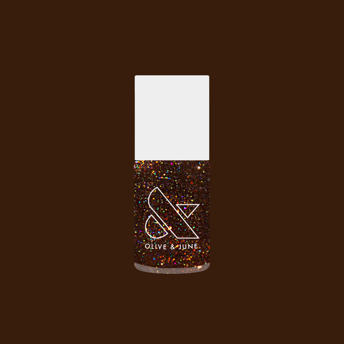 Olive and June Museum Date nail polish bottle with deep chocolate brown shade and multicolored shimmer gel polish