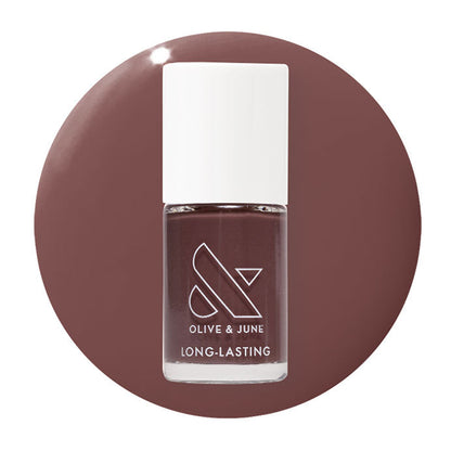 Olive and June Patron of the Arts gel polish bottle on dusty deep rose brown circular background
