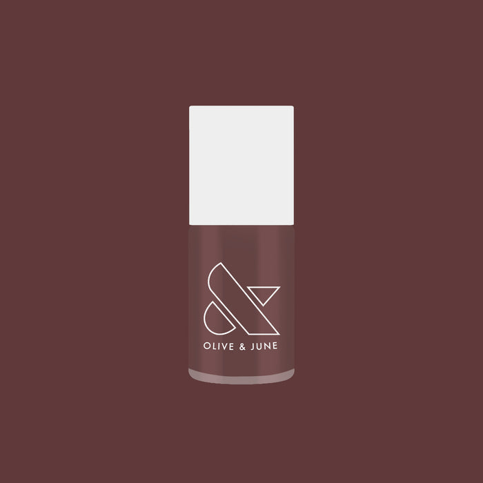 Olive and June Patron of the Arts nail polish bottle in dusty deep rose brown gel polish shade