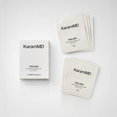KaramMD Polish Enzymatic Exfoliator skincare set, showing a white product box and multiple individual sachet packets on a clean white background.