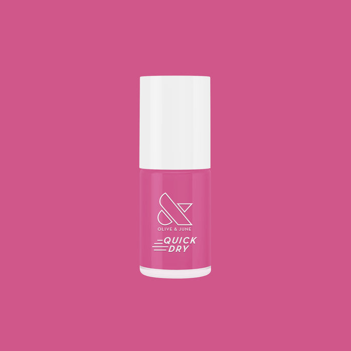 Prom nail polish bottle in bold magenta pink for quick drying and vibrant at-home manicure and pedicure looks