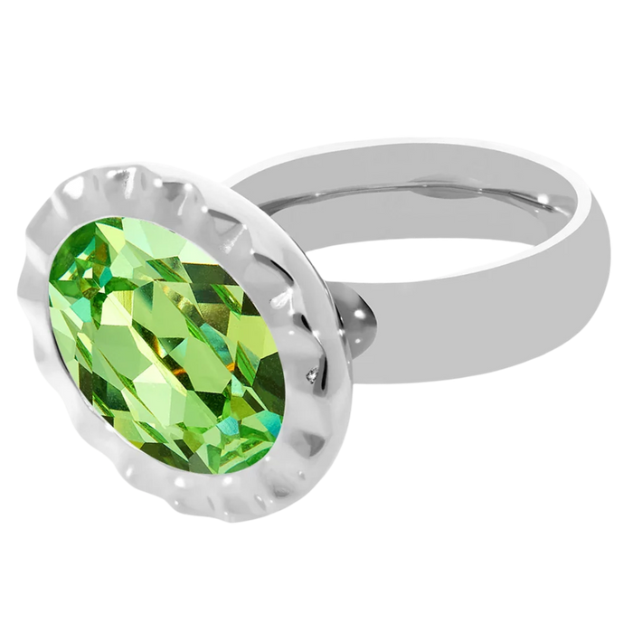 Silver ring with a green gemstone on a white background