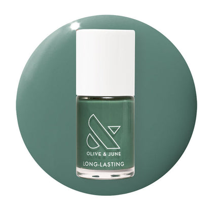 Still Life of Flowers long-lasting gel polish bottle in cool mossy green shade on matching green background