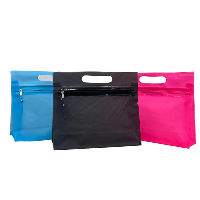 Three zip-top pouches with die-cut handles in blue, black, and pink, arranged side-by-side on a white studio background.