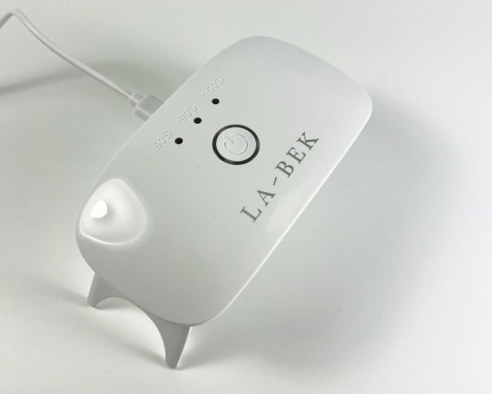 LA-BEK UV LED Lamp folded flat, showing the compact top view